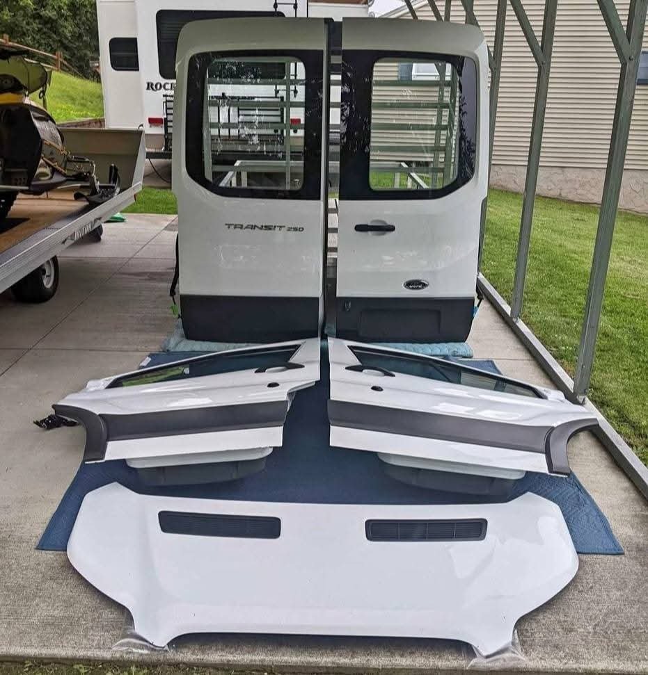 17-22 Ford Transit T150, T250, T350 front left/right side doors, hood and rear doors white OEM NICE!

Both driver and passenger front doors removed from a 2017 Ford Transit with the medium roof. These are white in color, (YZ) paint code, and are in very nice condition with no rot. Both doors are fully loaded, meaning you get the glass, interior panels, window motors, regulators. These are OEM Ford parts, not cheap aftermarket.