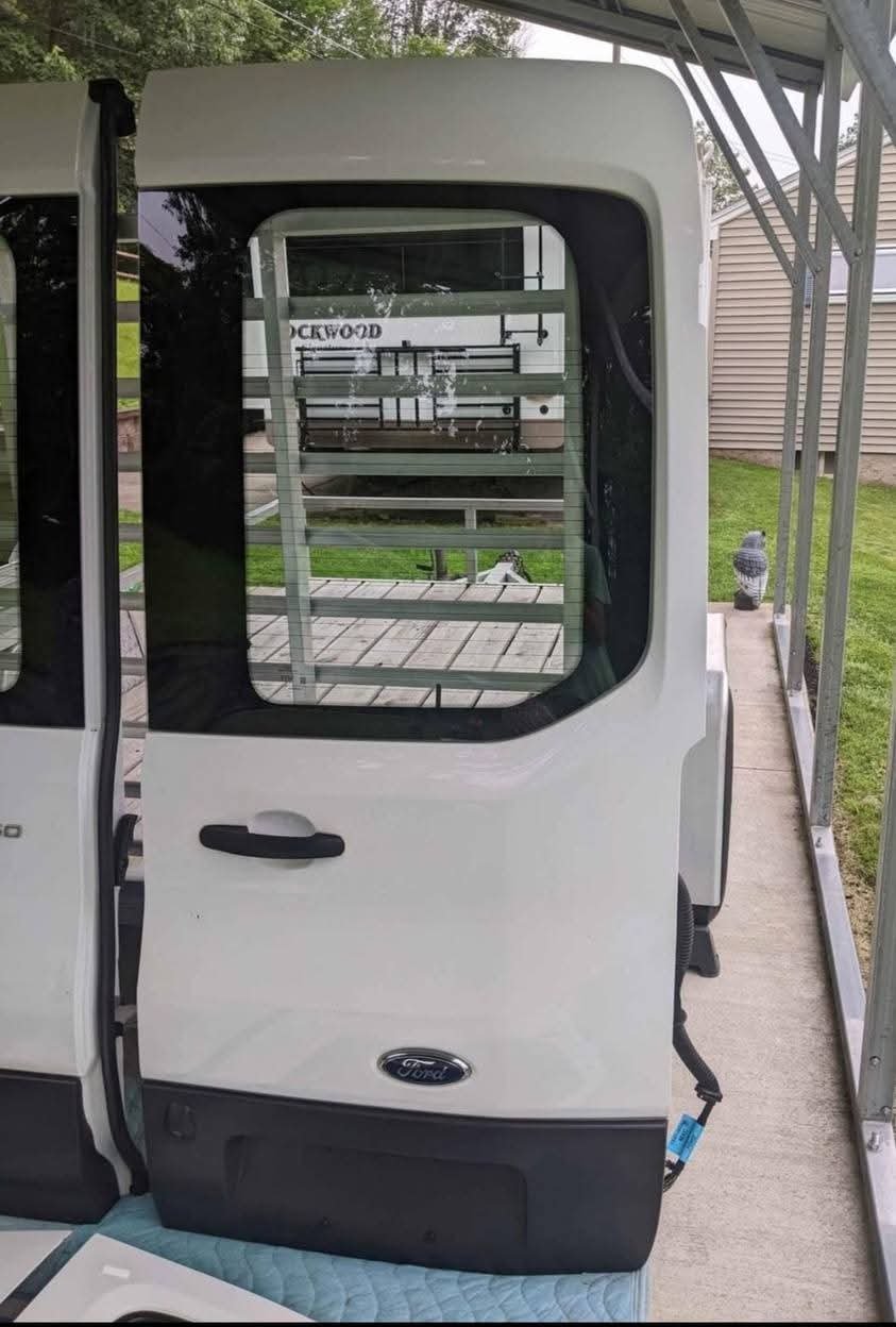 17-22 Ford Transit T150, T250, T350 front left/right side doors, hood and rear doors white OEM NICE!
Both driver and passenger front doors removed from a 2017 Ford Transit with the medium roof. These are white in color, (YZ) paint code, and are in very nice condition with no rot. Both doors are fully loaded, meaning you get the glass, interior panels, window motors, regulators. These are OEM Ford parts, not cheap aftermarket. - Image 2